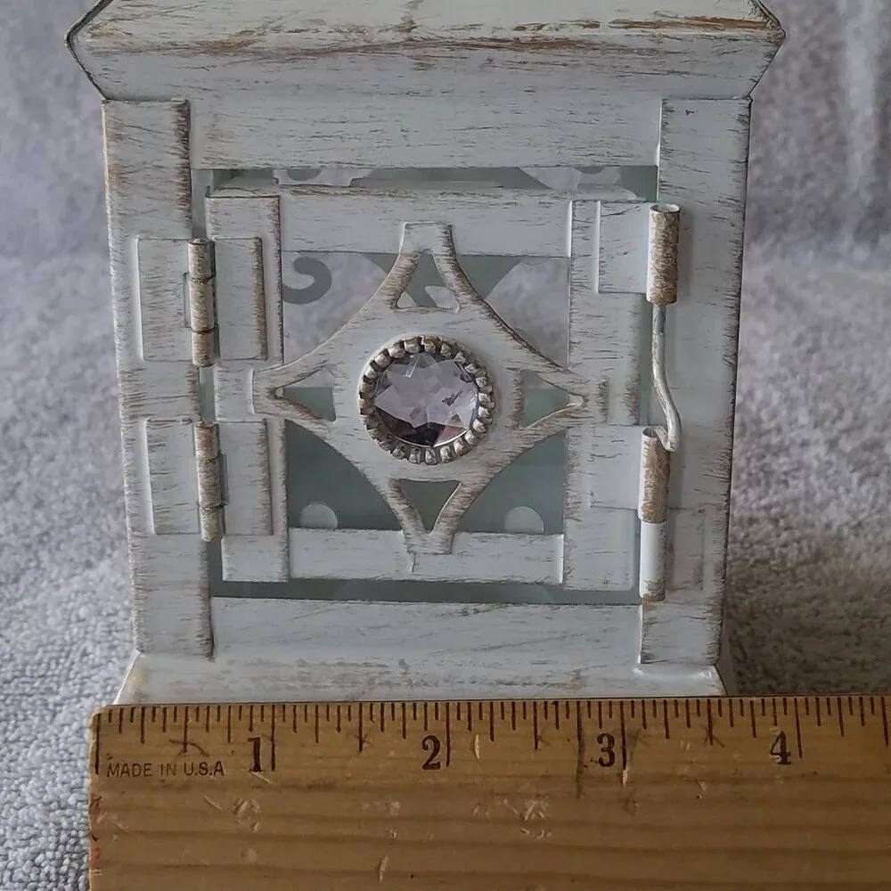 ASHLAND'S ELEGANT ANTIQUE LANTERN IN OFF WHITE WITH DISTRESSED DESIGN IN METAL